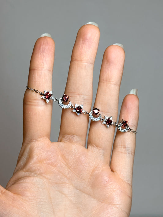 BRACCIALE IN GRANATO SOLE E MEZZALUNA