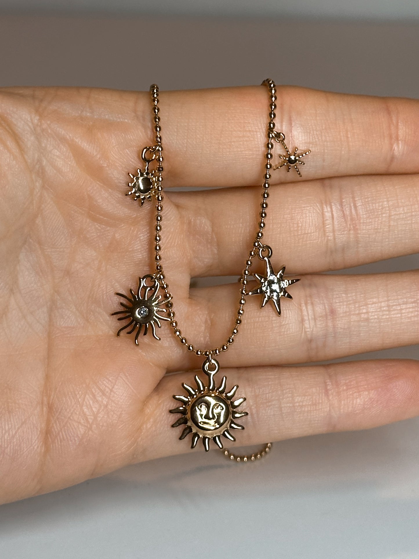 COLLANA SOLE E STELLE GOLD (ACCIAIO INOX)