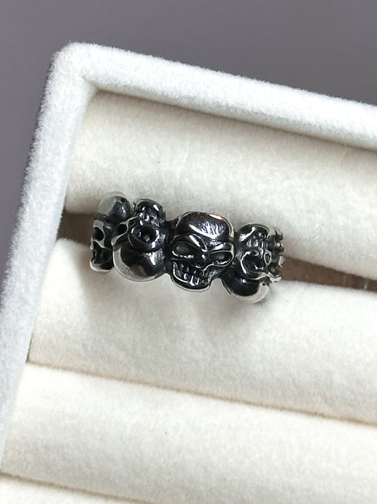 ANELLO TESCHI ALTERNATI (ACCIAIO INOX)