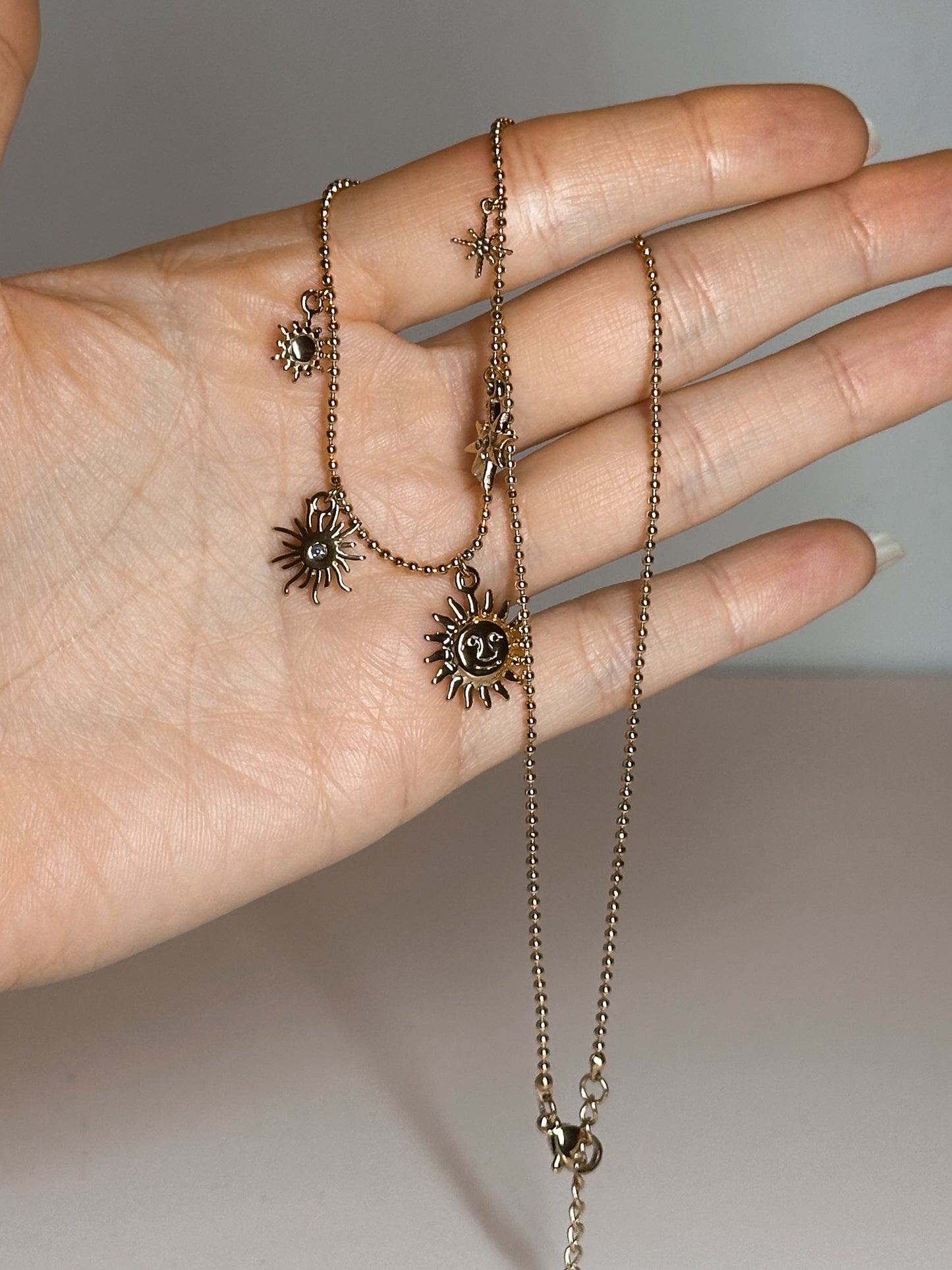 COLLANA SOLE E STELLE GOLD (ACCIAIO INOX)